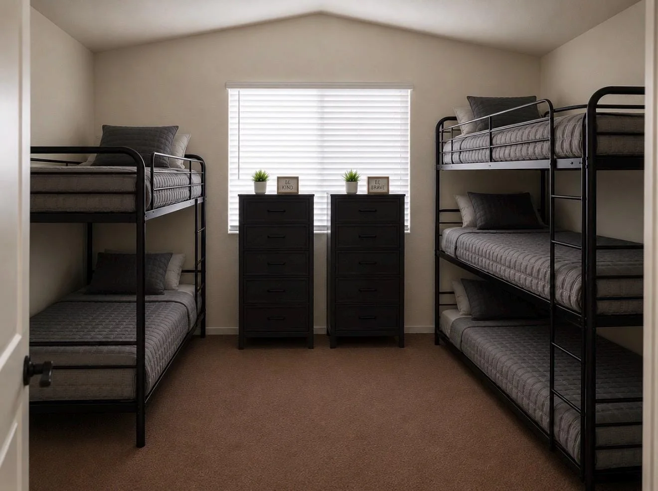 Shared bedroom with bunk beds and personal storage